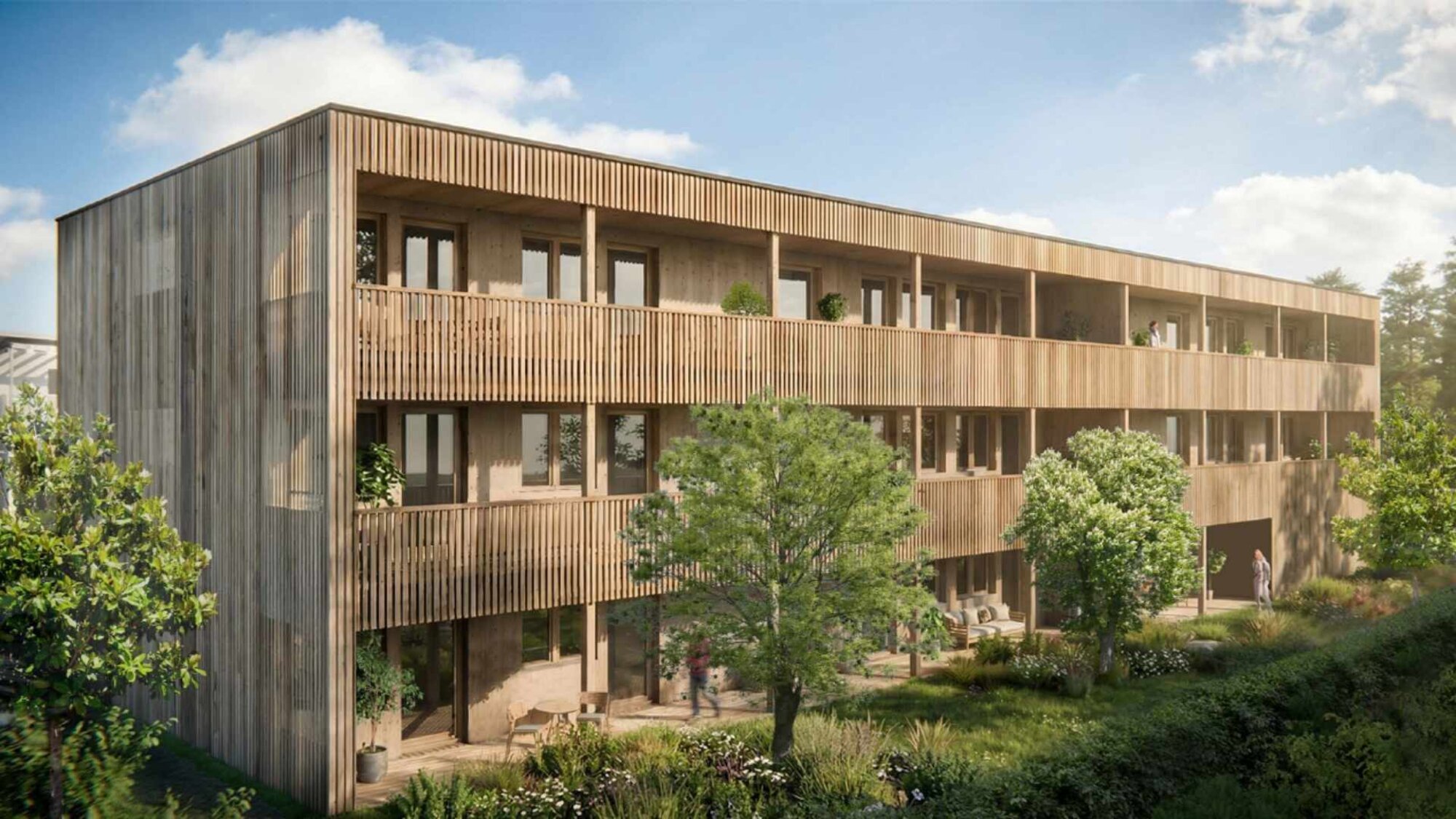 Frontansicht des modernen Holzhauses mit Zweiraumwohnungen in Feldkirch-Tosters, Vorarlberg