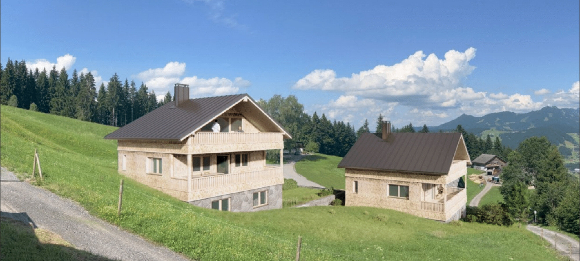 Ferienchalets aus Holz auf sonniger Bergwiese mit Alpenblick in Egg, Vorarlberg